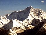 Kathmandu Mountain Flight 09-2 Makalu 1997 The massive west face of Makalu (8462m) is seen from the Kathmandu Mountain Flight. The ridge in the centre of the photo is the exceedingly difficult, very steep Makalu West Pillar. Kangchungtse (7678m, also called Makalu II) is on the left.